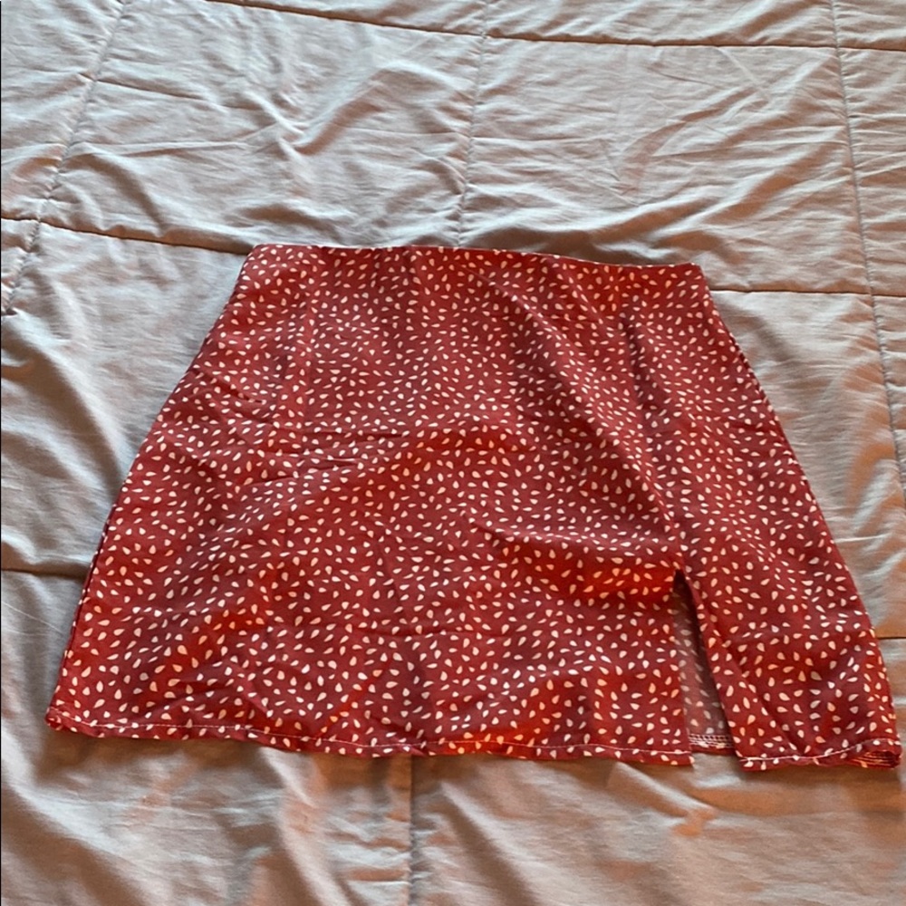 Red mini skirt with slit